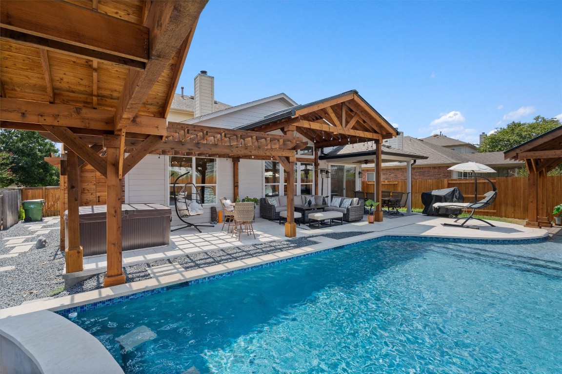 542 Centerbrook Place Round Rock, TX 78665 - Photo 39 of 40 a view of a house with backyard porch and sitting area