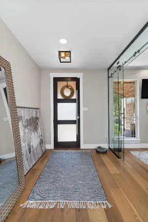 a view of empty room with window and front door