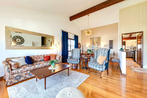 a living room with furniture and a table