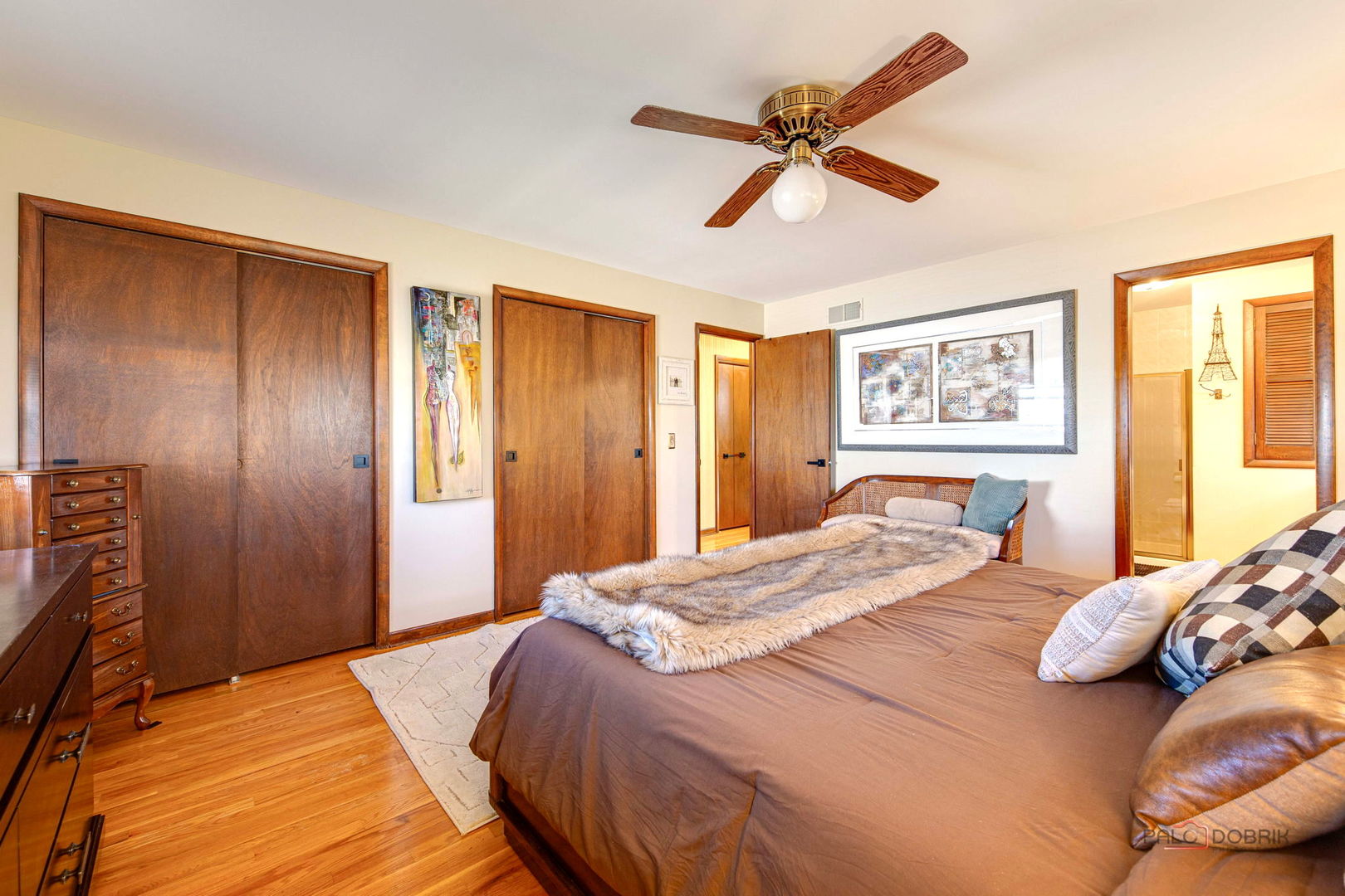 2042 South Goebbert Road Arlington Heights, IL 60005 - Photo 25 of 34 a bedroom with a bed and a dresser