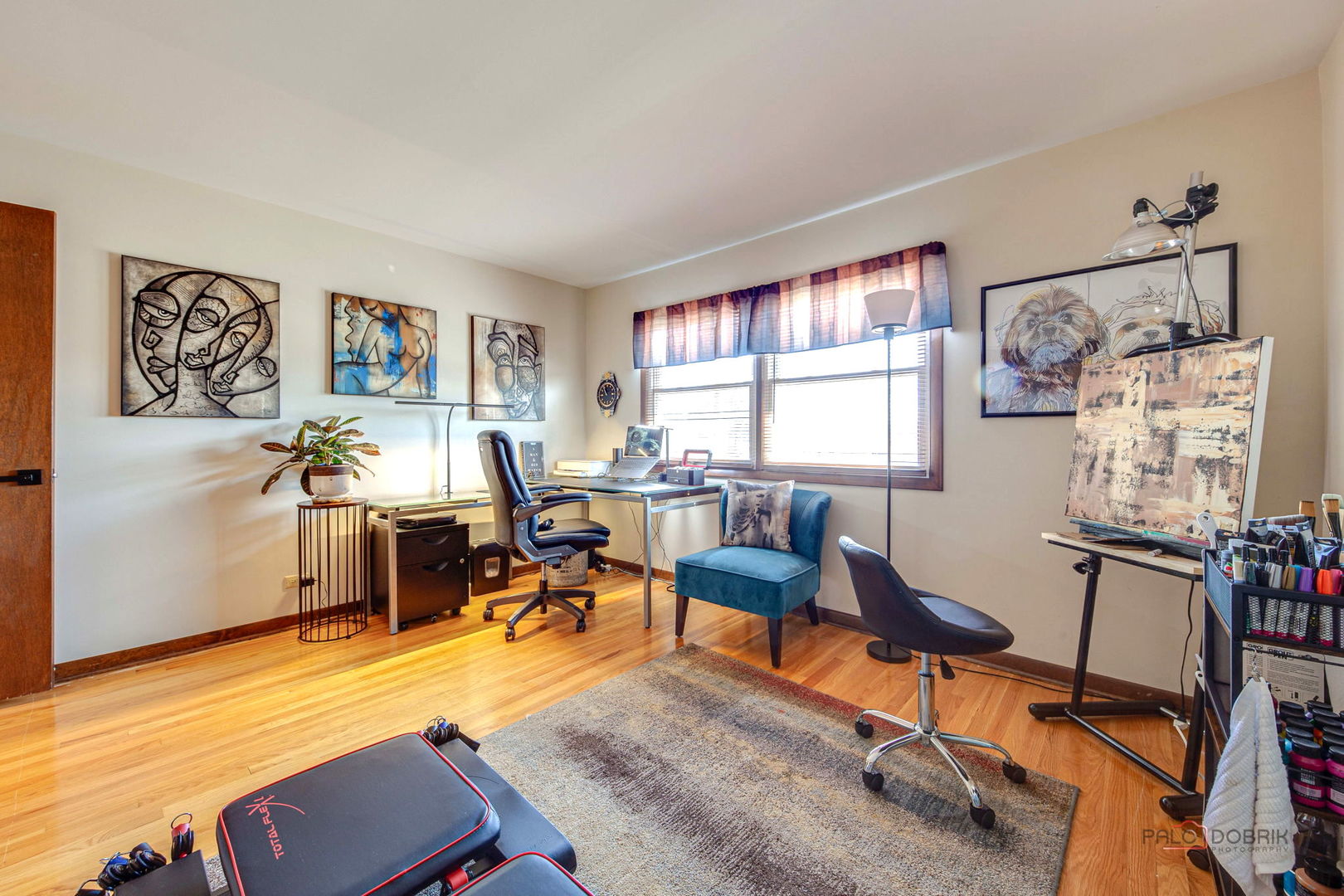 2042 South Goebbert Road Arlington Heights, IL 60005 - Photo 26 of 34 a living room with furniture and a flat screen tv