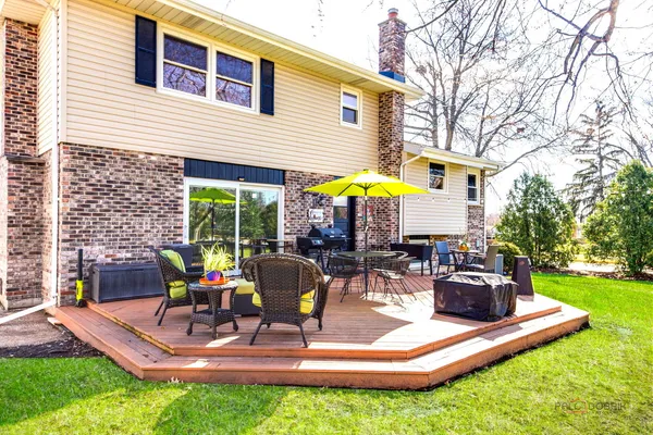 a view of outdoor space yard deck patio and outdoor kitchen