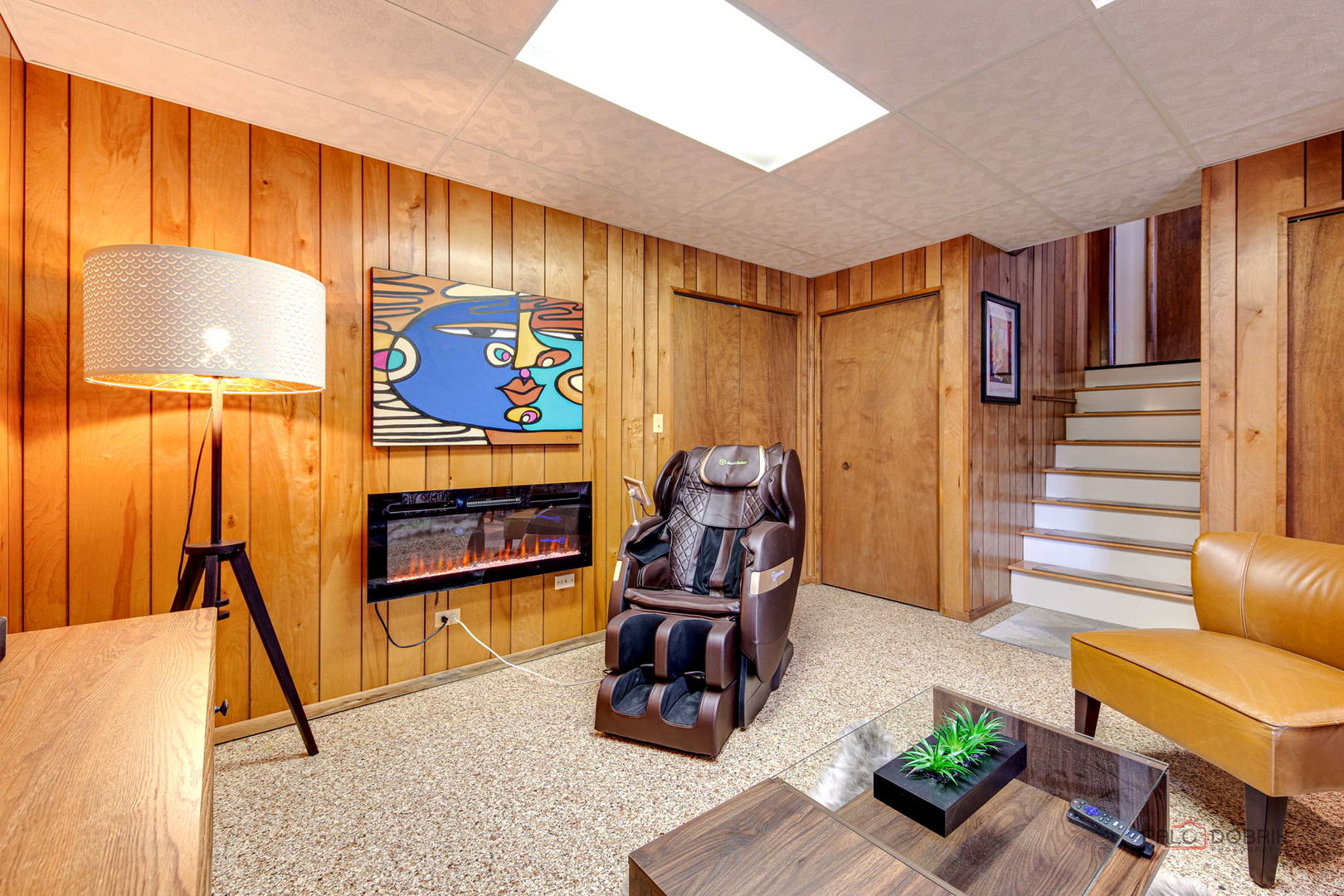 2042 South Goebbert Road Arlington Heights, IL 60005 - Photo 31 of 34 a room with furniture and a flat screen tv