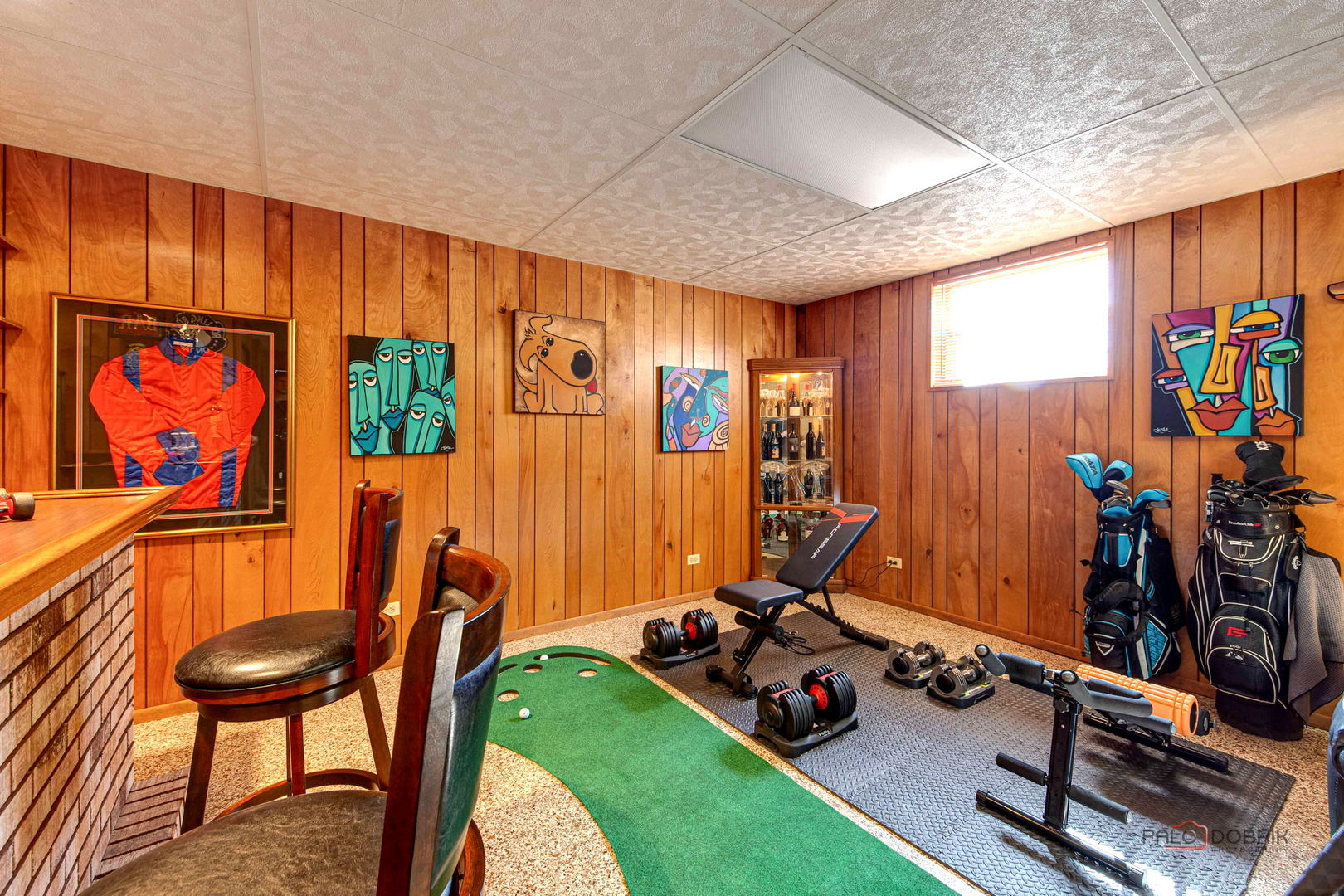 2042 South Goebbert Road Arlington Heights, IL 60005 - Photo 32 of 34 a room with furniture and musical instruments