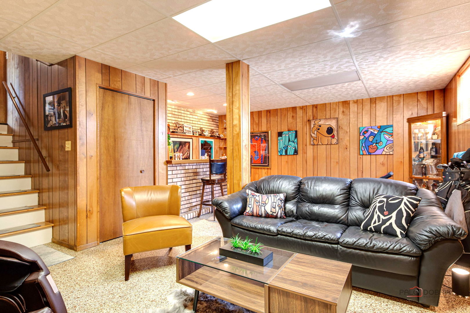 2042 South Goebbert Road Arlington Heights, IL 60005 - Photo 34 of 34 a living room with furniture and a flat screen tv