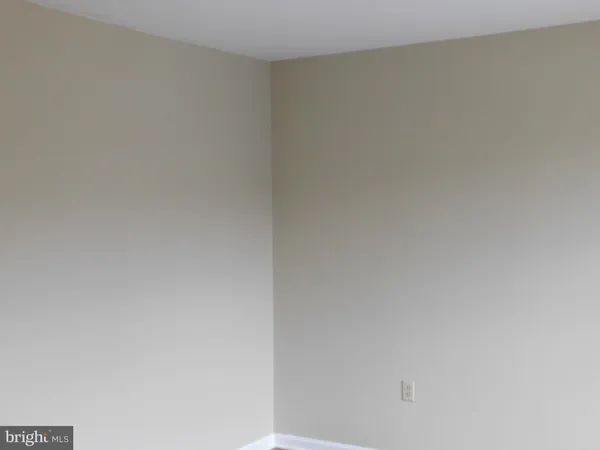 a close up of a white marble wall