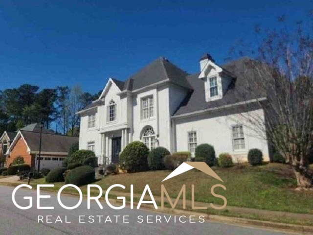 3815 Sidestreet Chamblee, GA 30341 - Photo 1 of 1 a view of a street with house in the background