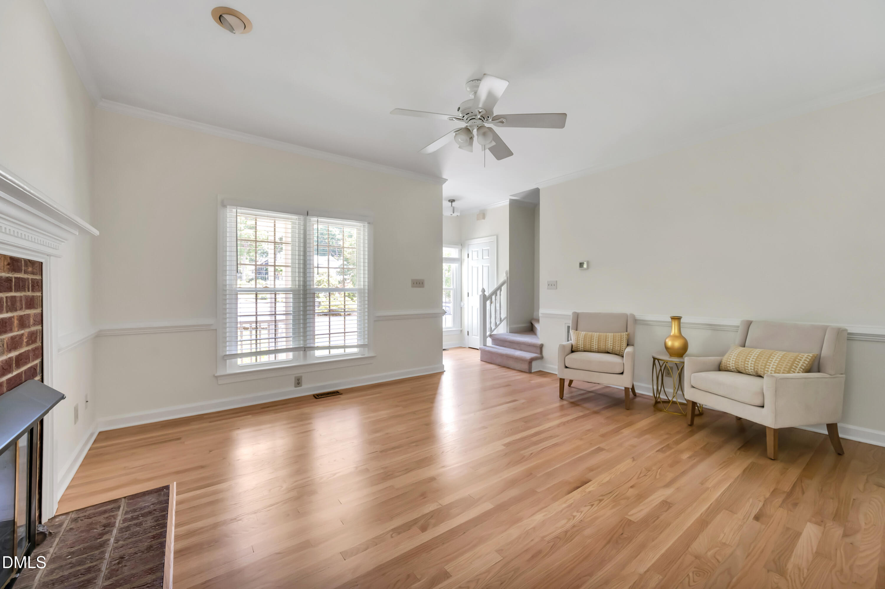 7500 Drayton Court Raleigh, NC 27615 - Photo 3 of 27 a living room with furniture and a wooden floor