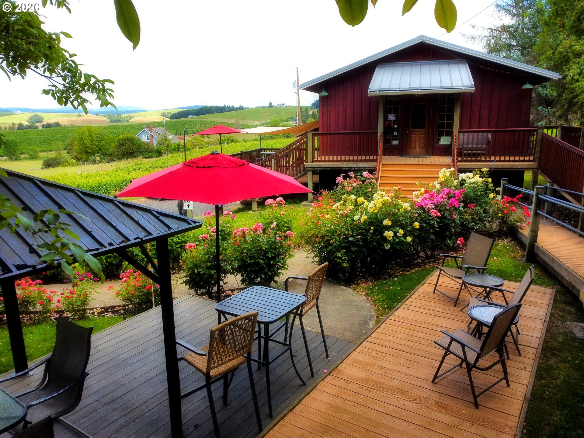 18700 Northwest Adcock Road Yamhill, OR 97148 - Photo 24 of 42 an outdoor space with furniture and umbrella