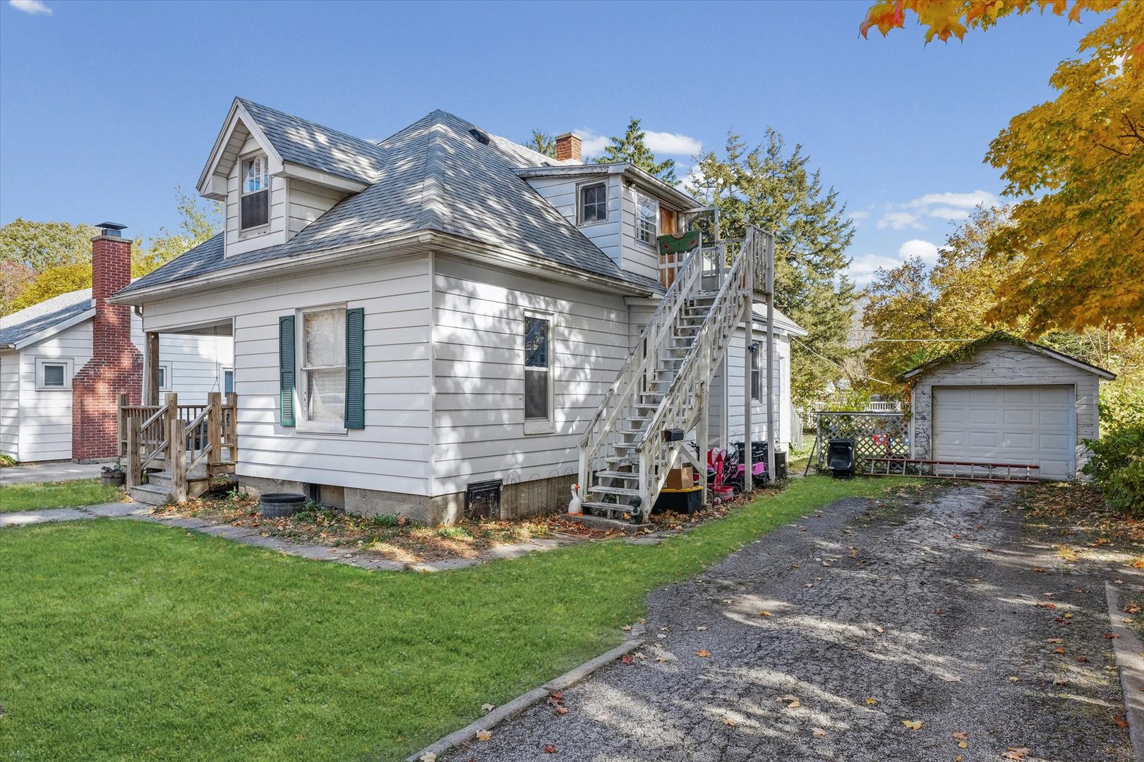 208 South Poplar Street Urbana, IL 61802 - Photo 2 of 30 a view of a house with a yard and pathway