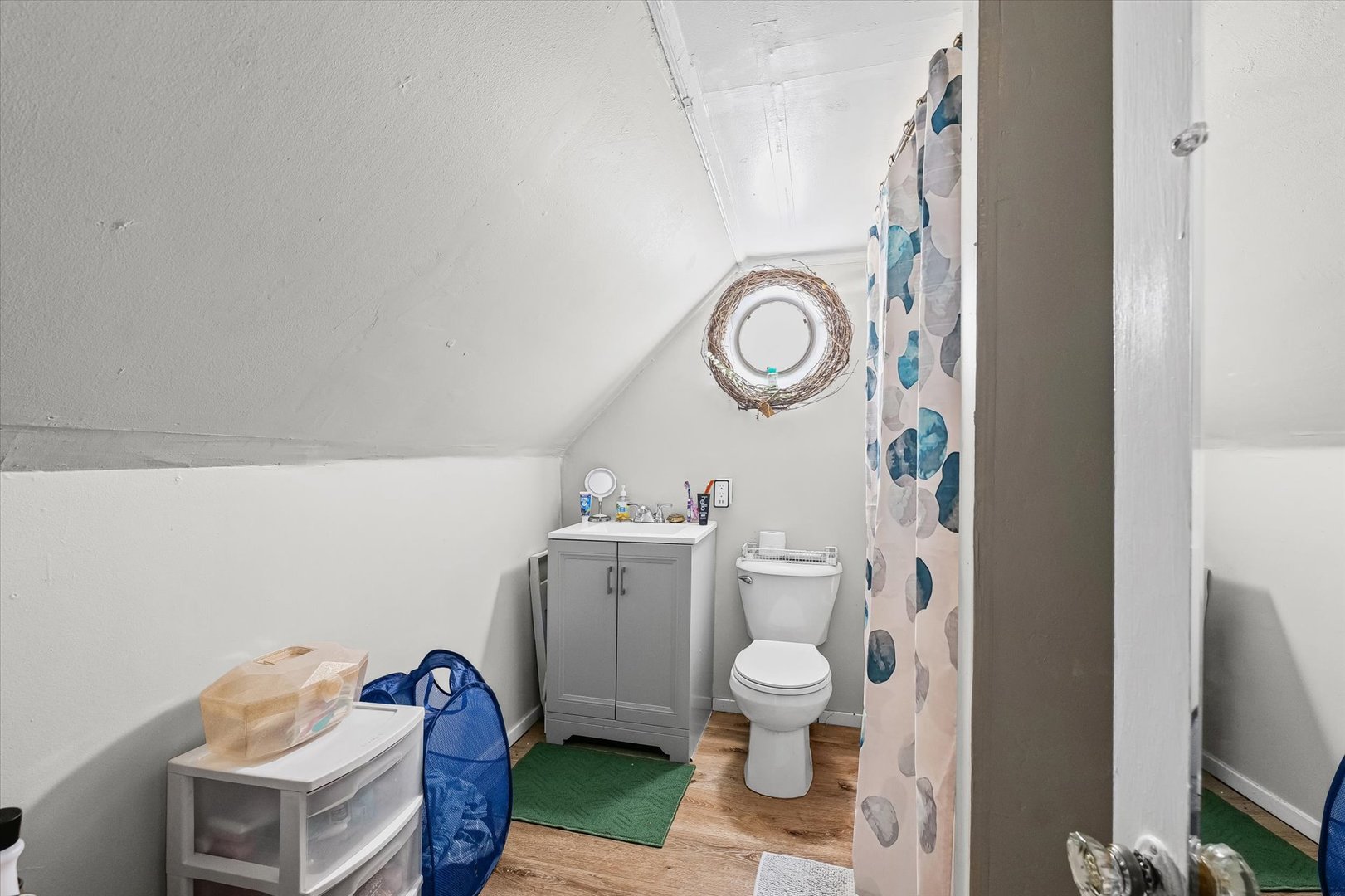 208 South Poplar Street Urbana, IL 61802 - Photo 24 of 30 a bathroom with a toilet and a sink