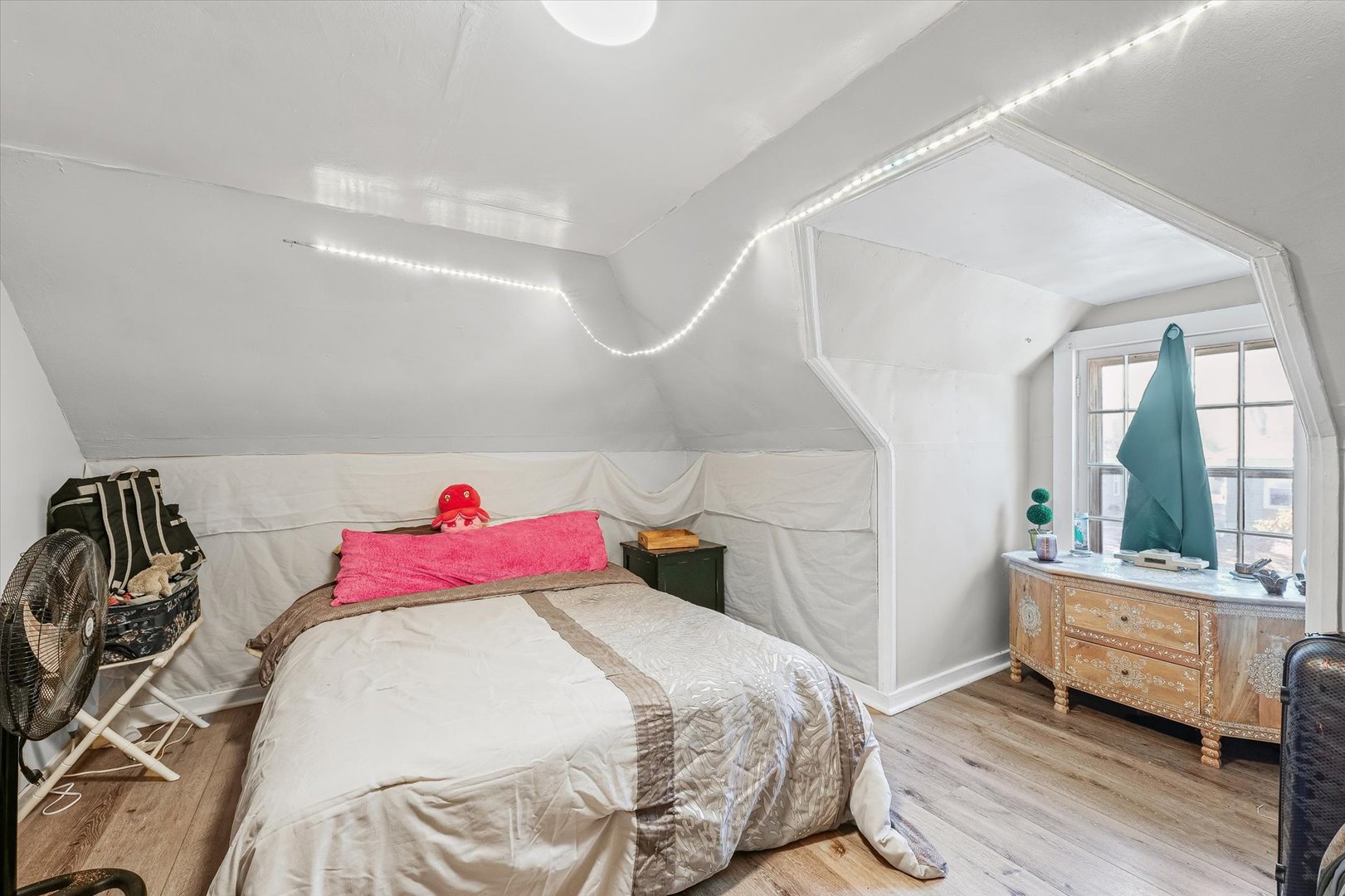 208 South Poplar Street Urbana, IL 61802 - Photo 25 of 30 a bedroom with a bed and a window