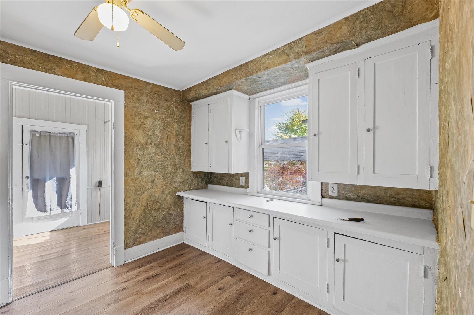 208 South Poplar Street Urbana, IL 61802 - Photo 9 of 30 a view of cabinets a sink and a stove top oven