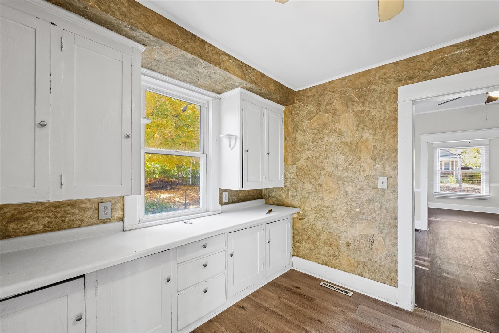 208 South Poplar Street Urbana, IL 61802 - Photo 10 of 30 a bathroom with a granite countertop sink a toilet and a shower