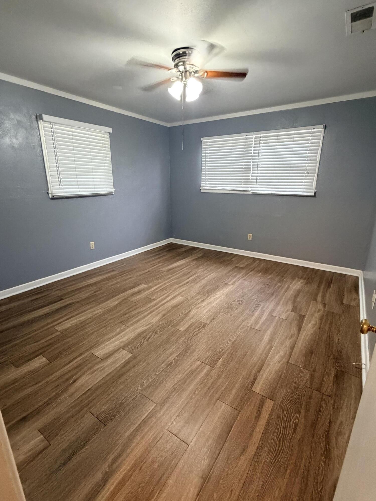3814 27th Street Lubbock, TX 79410 - Photo 19 of 24 a view of an empty room with a window
