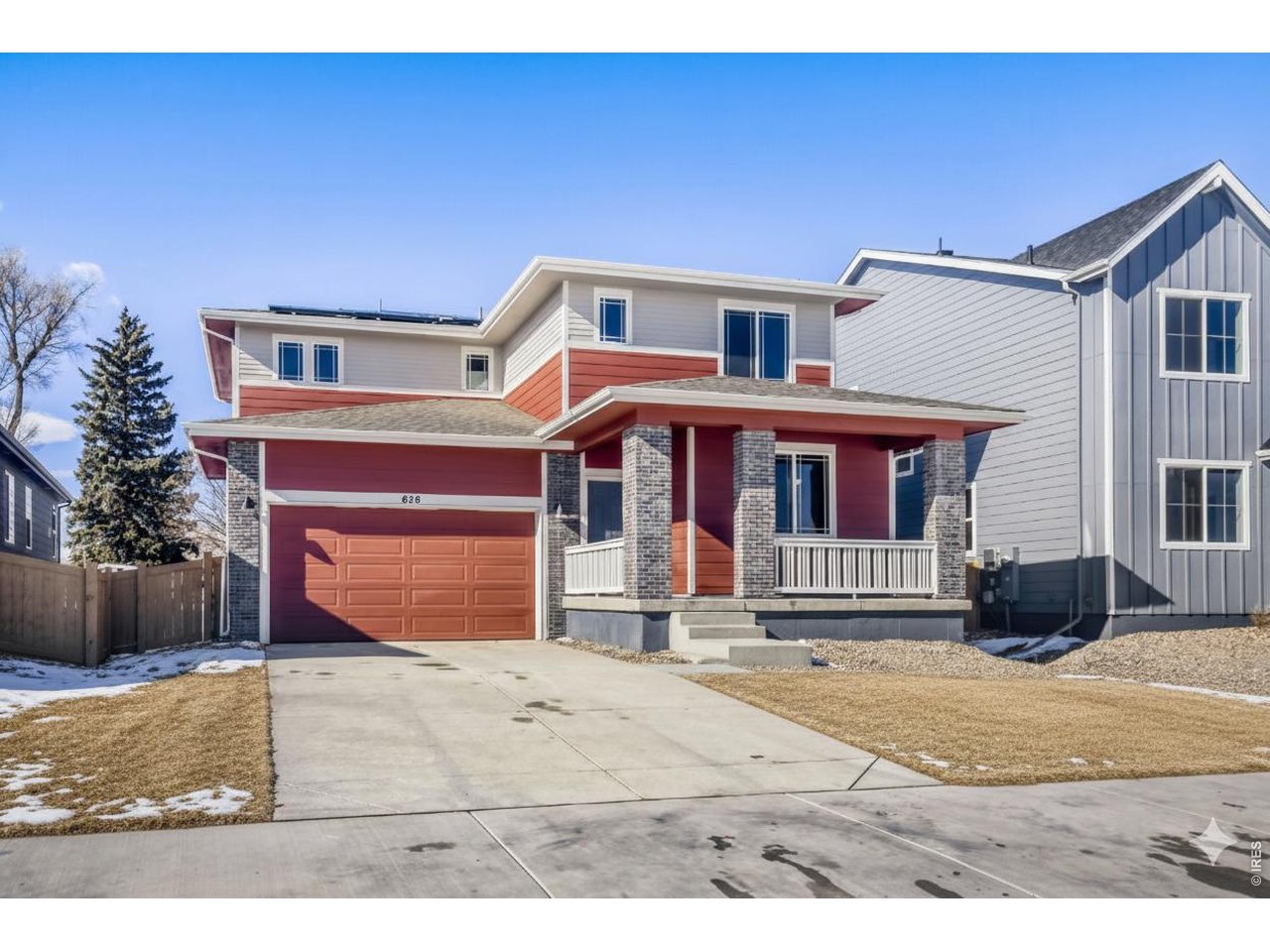 656 Noola Street Windsor, CO 80550 - Photo 22 of 33 a front view of a house with a yard