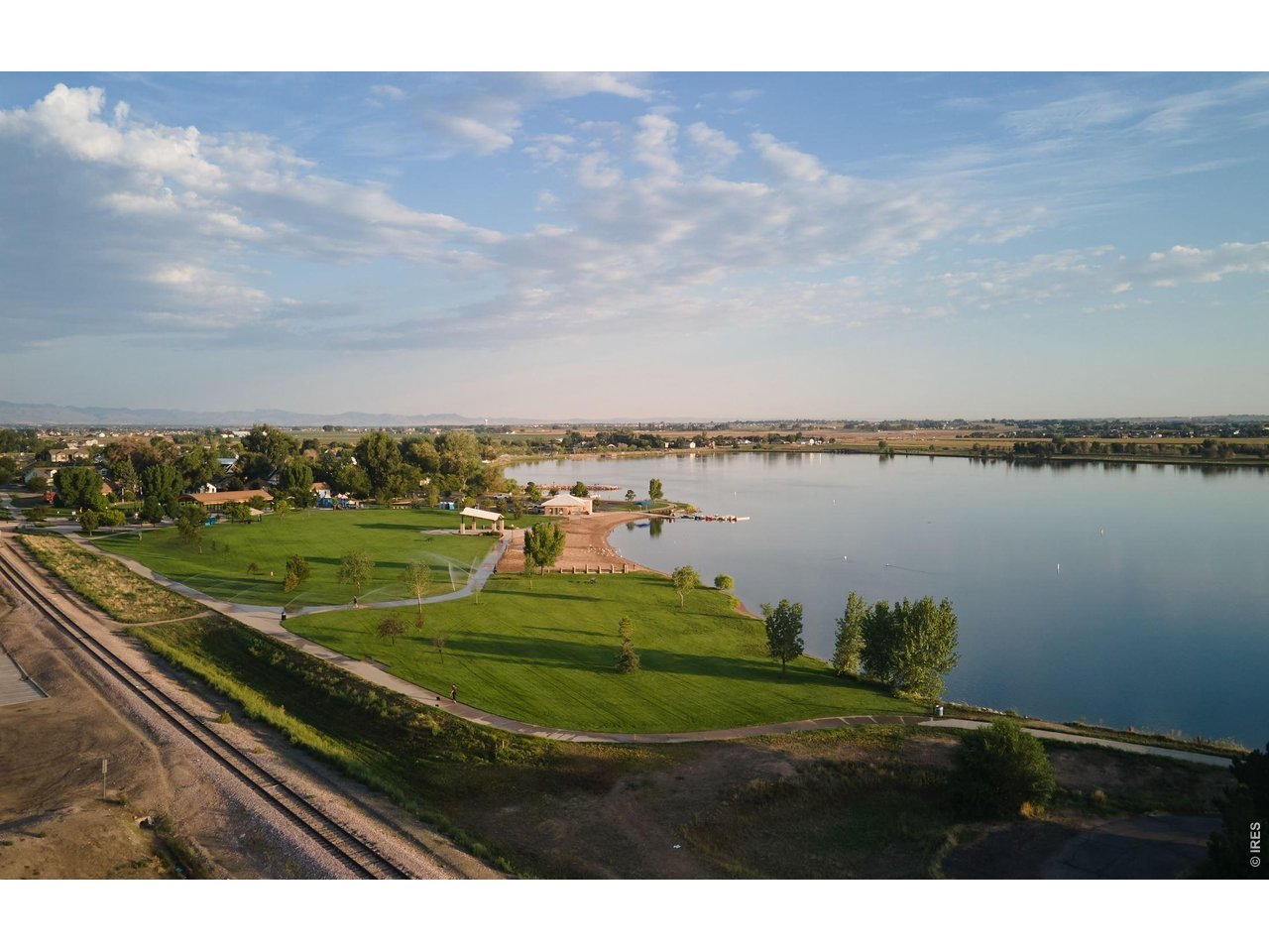 656 Noola Street Windsor, CO 80550 - Photo 26 of 33 a view of a lake and outdoor space