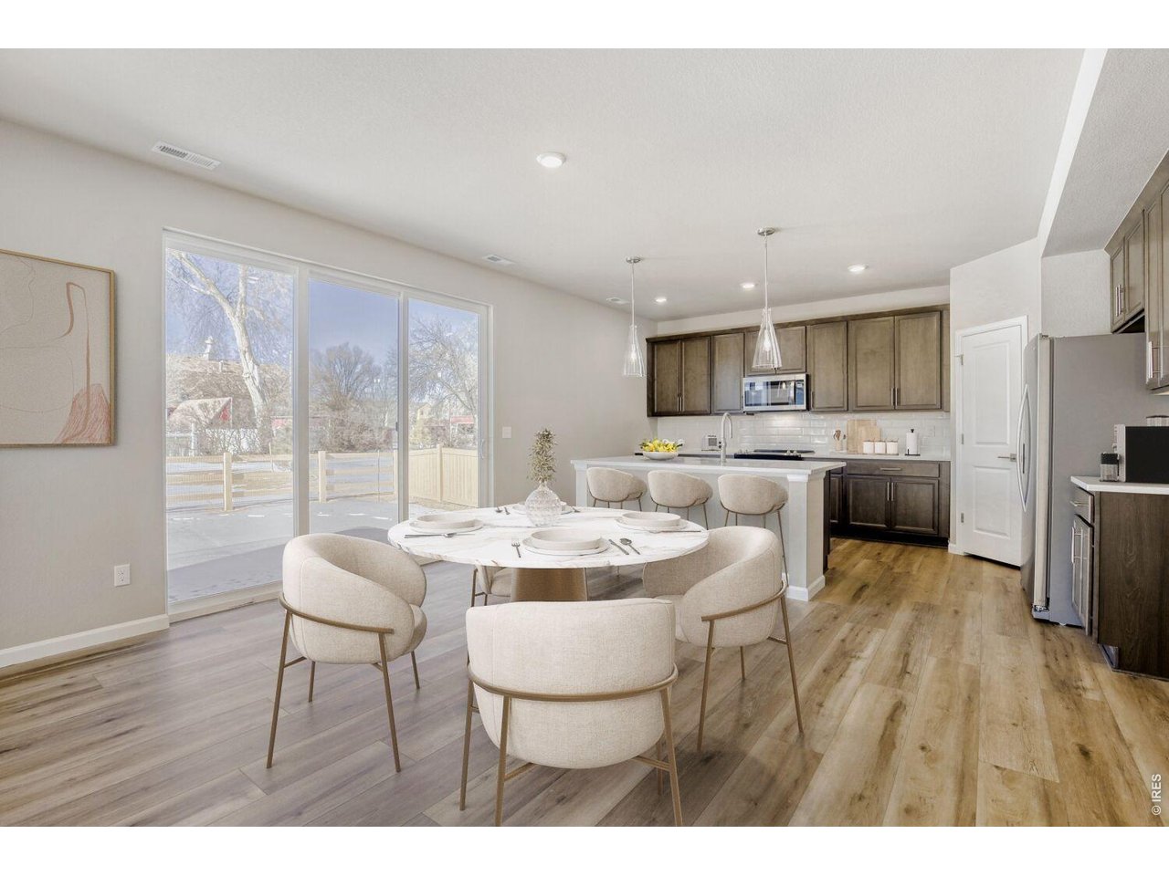 656 Noola Street Windsor, CO 80550 - Photo 6 of 32 KITCHEN AND DINING ROOM