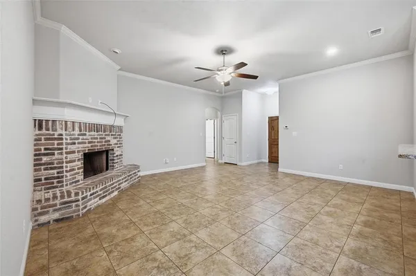 a large kitchen with stainless steel appliances granite countertop a sink stove and cabinets