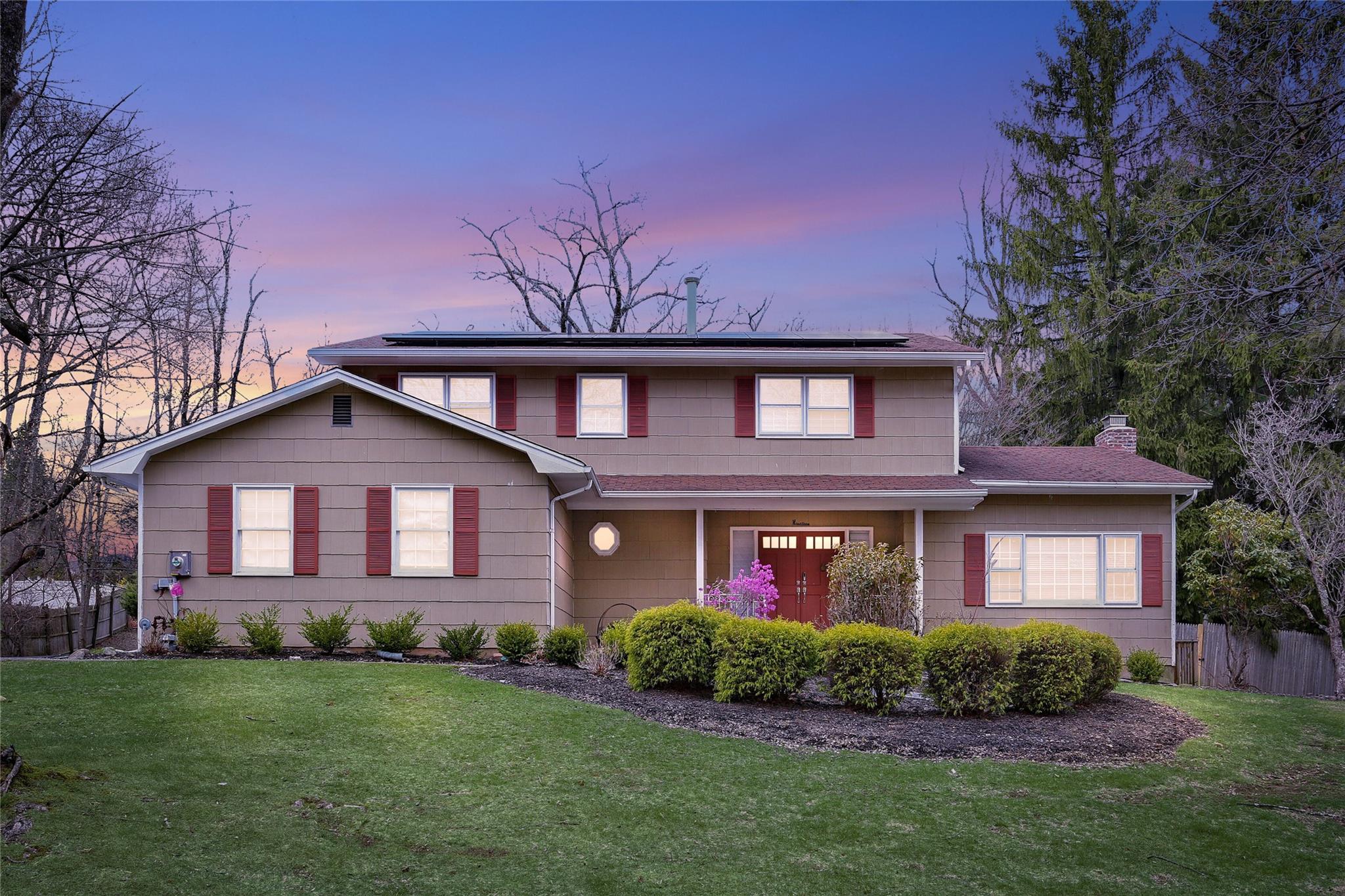 19 Wits End Spring Valley, NY 10977 - Photo 1 of 28 a front view of a house with a yard and garage