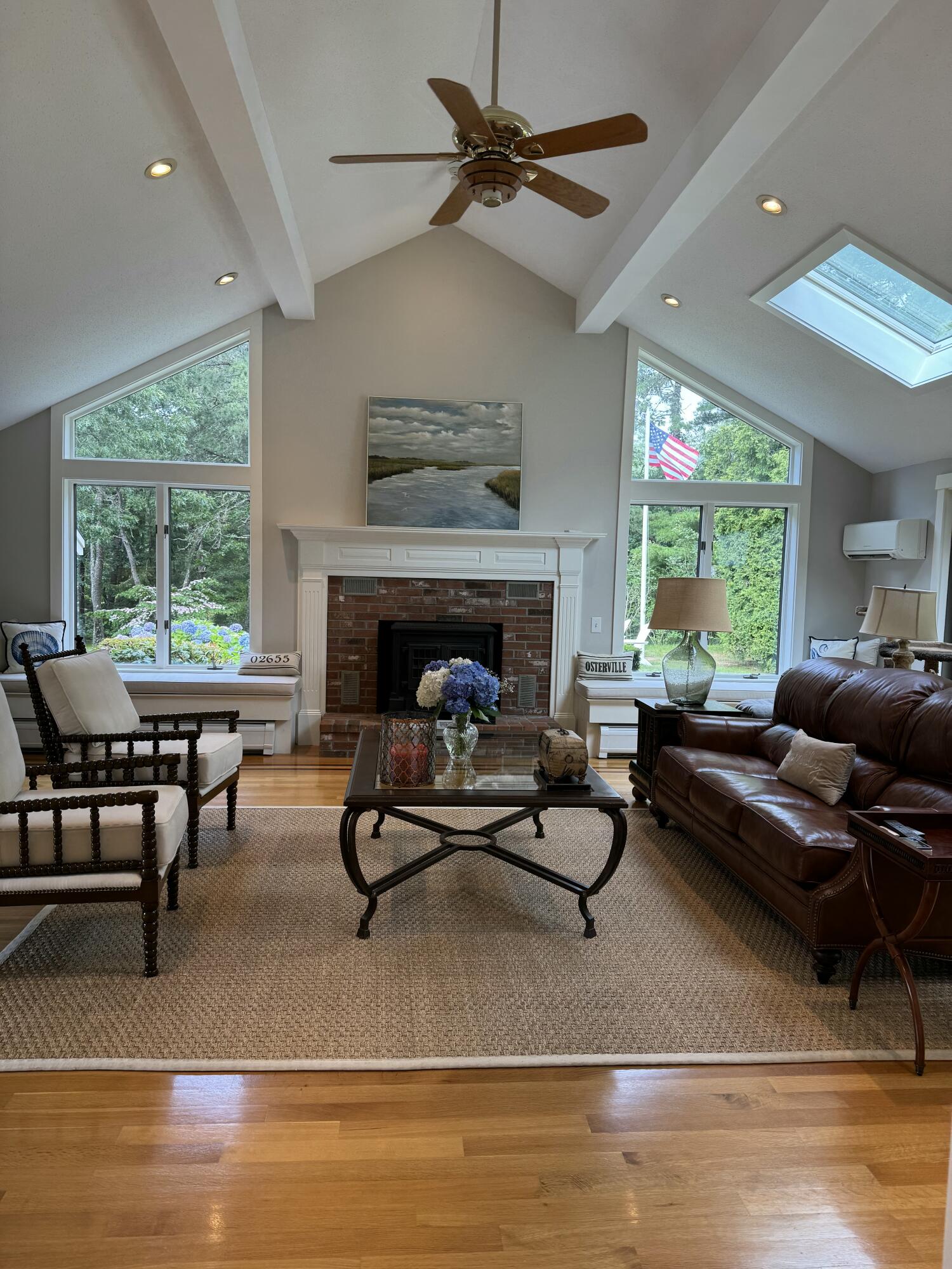 98 Bunker Hill Road Osterville, MA 02655 - Photo 27 of 88 a living room with furniture and a fireplace