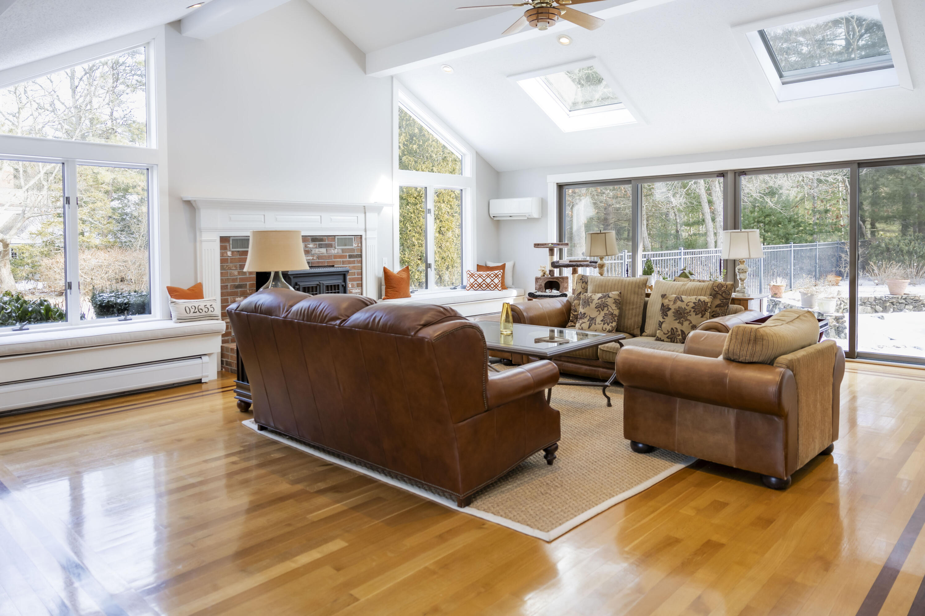 98 Bunker Hill Road Osterville, MA 02655 - Photo 29 of 88 a living room with furniture large windows and wooden floor