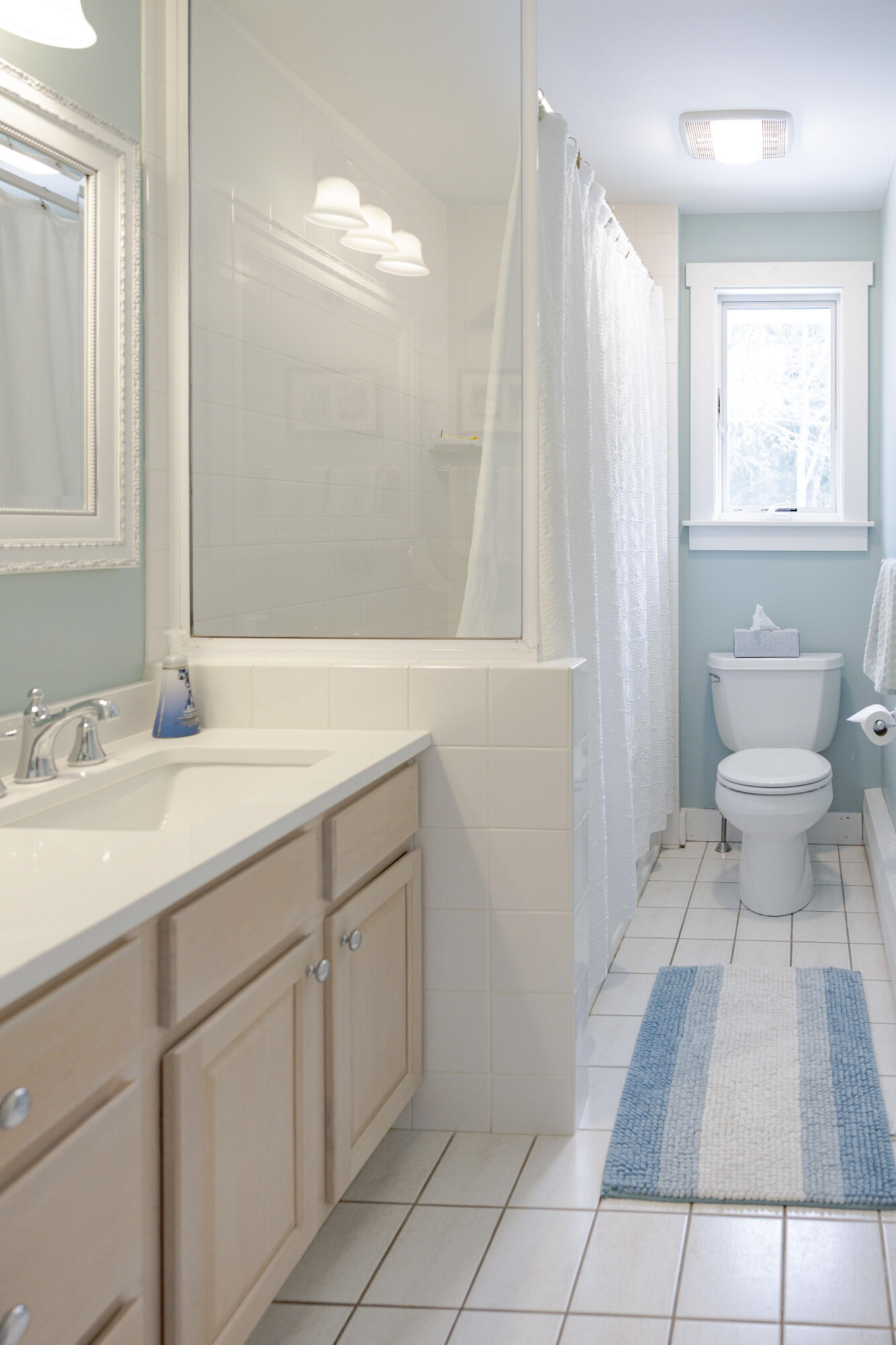 98 Bunker Hill Road Osterville, MA 02655 - Photo 63 of 88 a bathroom with a sink and a mirror