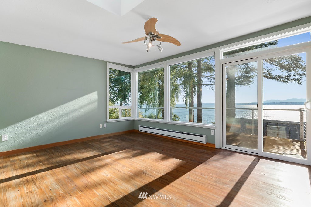5036 Scurlock Road Freeland, WA 98249 - Photo 19 of 25 a view of an empty room with a window