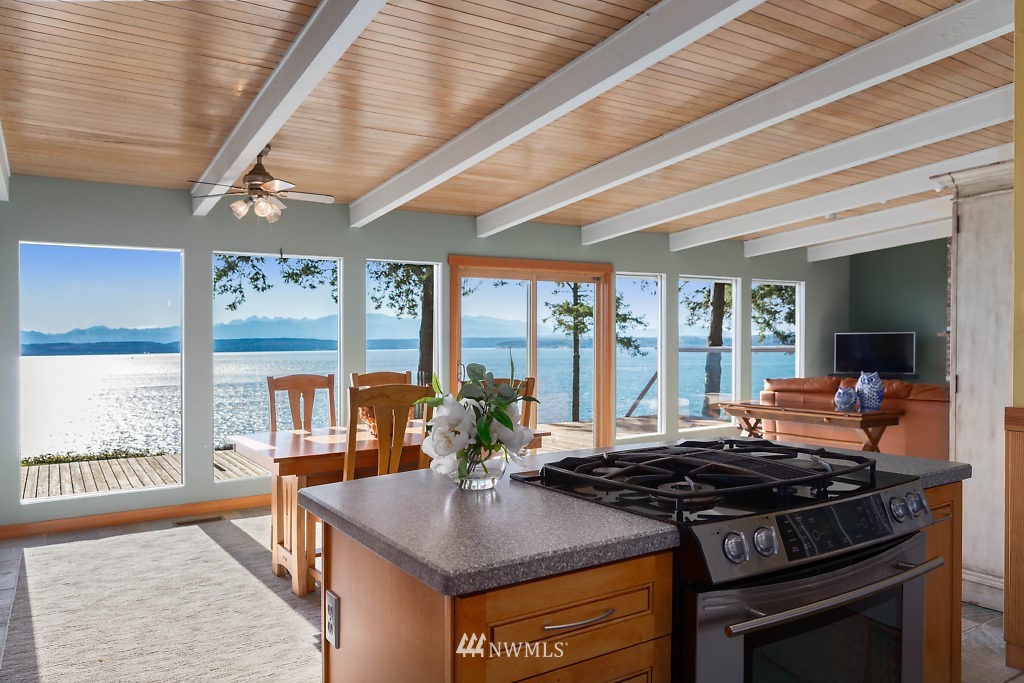 5036 Scurlock Road Freeland, WA 98249 - Photo 7 of 25 a kitchen with a stove and a view of living room