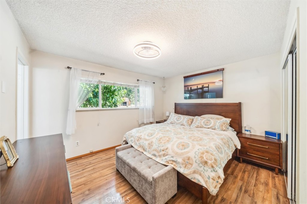 6791 Whispering Canyon Drive Anderson, CA 96007 - Photo 13 of 51 a bedroom with a bed and a window