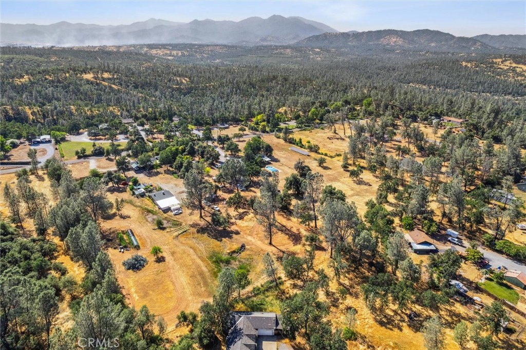 6791 Whispering Canyon Drive Anderson, CA 96007 - Photo 45 of 51 a view of a town with mountains in the background