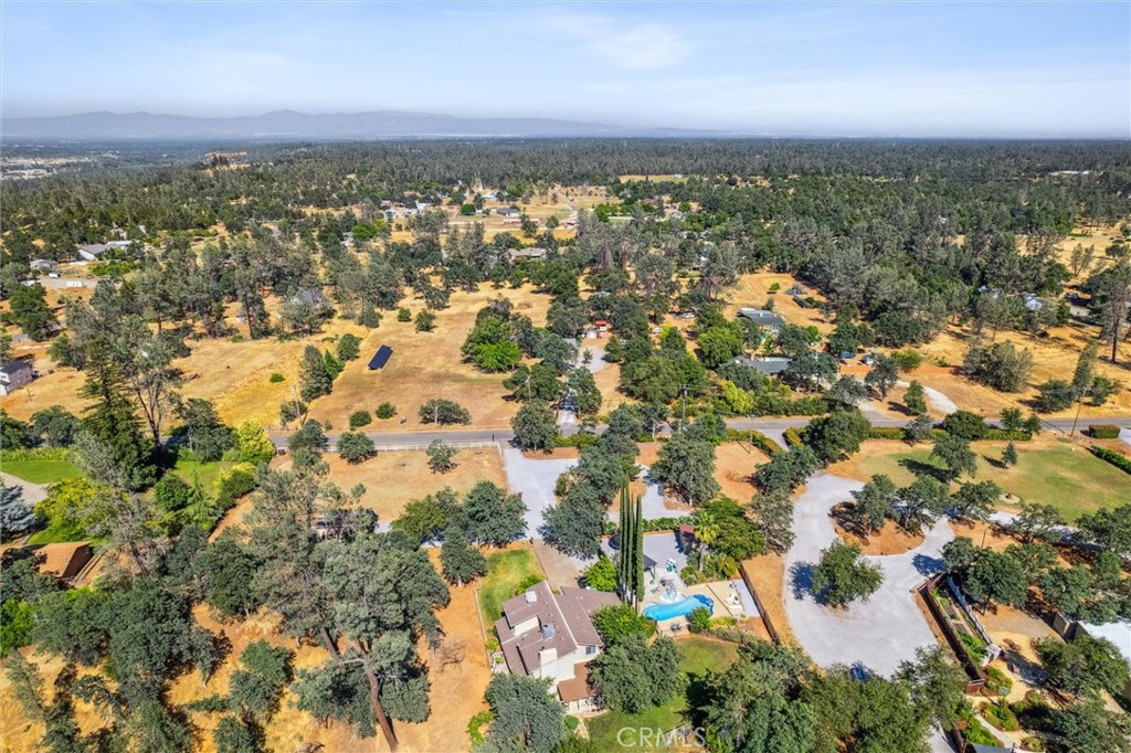 6791 Whispering Canyon Drive Anderson, CA 96007 - Photo 49 of 51 an aerial view of residential building with parking space
