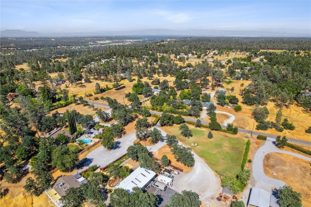 6791 Whispering Canyon Drive Anderson, CA 96007 - Photo 50 of 51 an aerial view of residential building with parking space