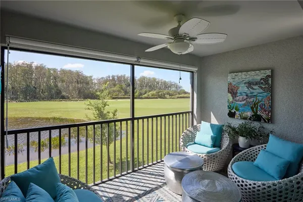 a view of a porch with furniture