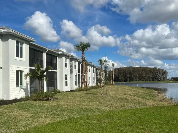 a view of a backyard of the house