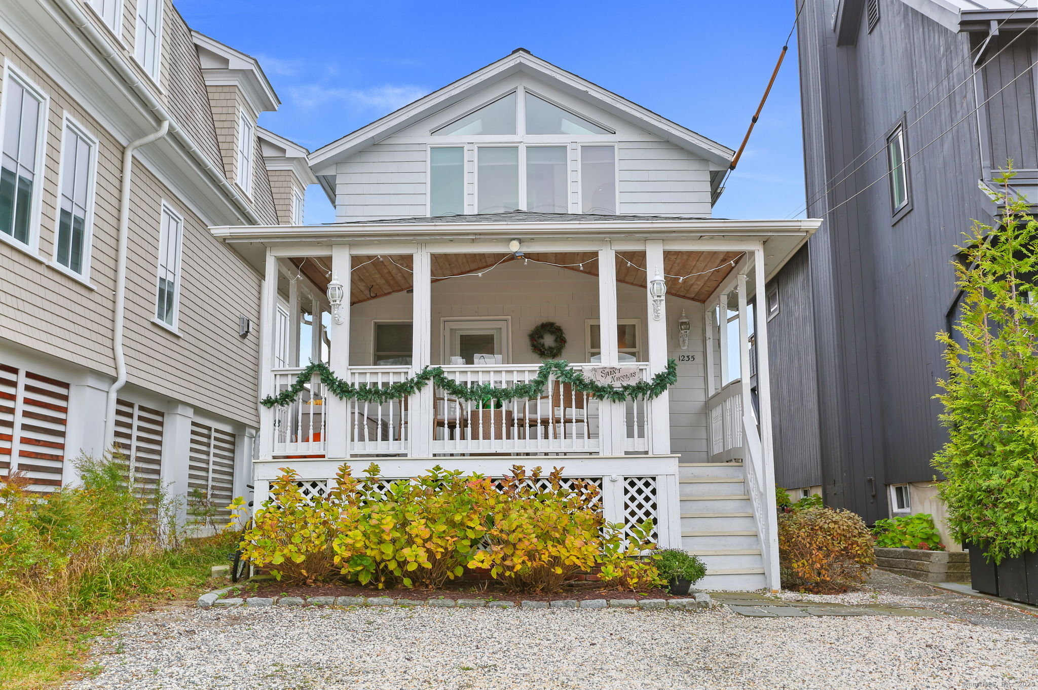 1235 Fairfield Beach Road Fairfield, CT 06824 - Photo 2 of 39 front view of house with a yard