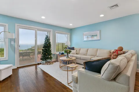 a view of a terrace with sitting area