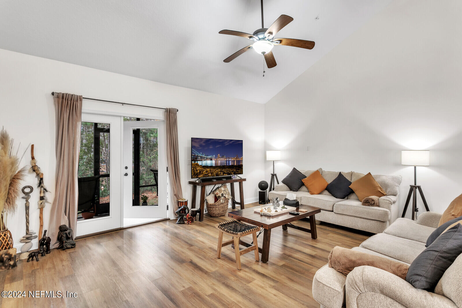 4190 Quiet Crk Loop Middleburg, FL 32068 - Photo 11 of 22 a living room with furniture a ceiling fan and a rug