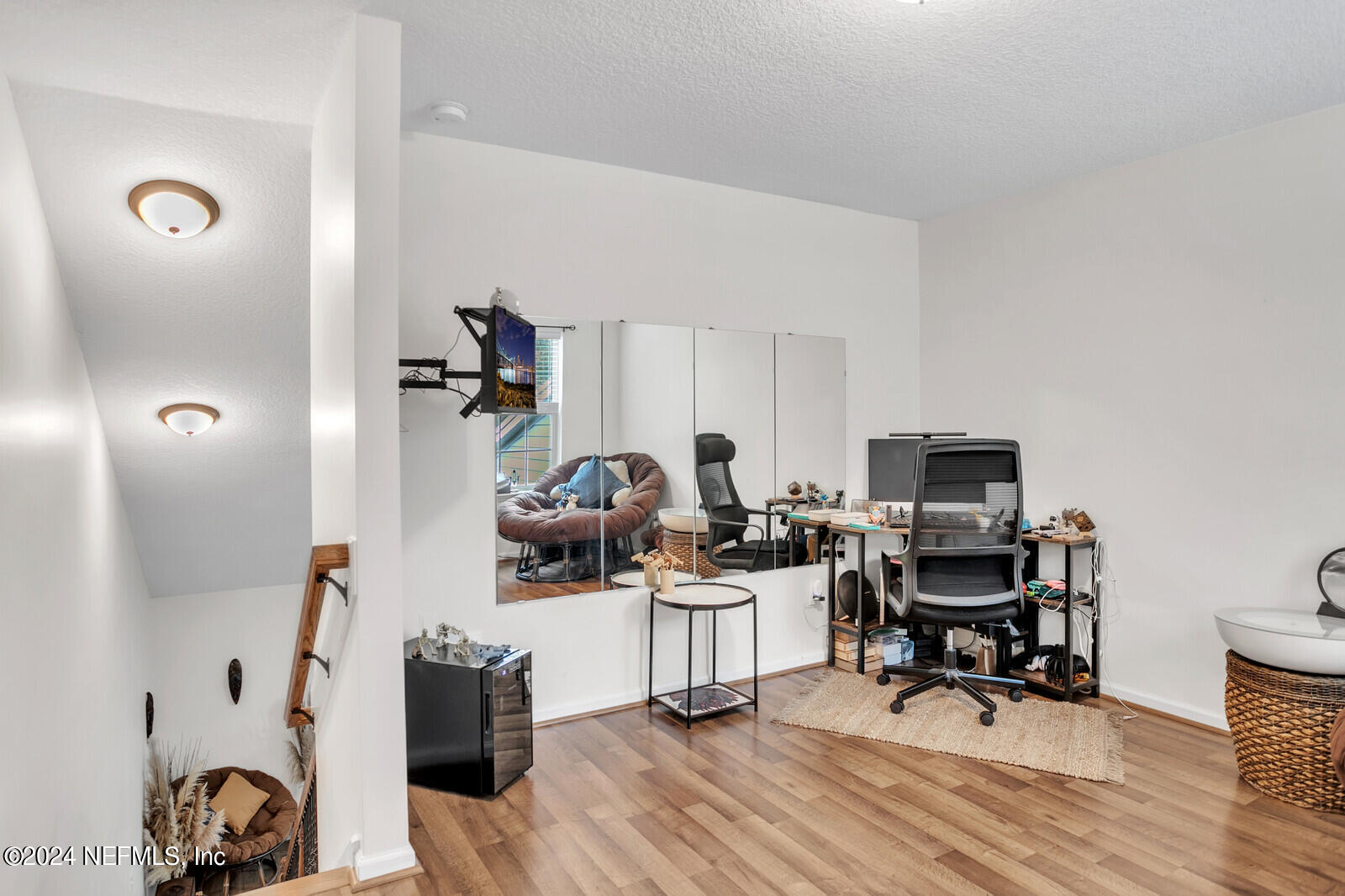 4190 Quiet Crk Loop Middleburg, FL 32068 - Photo 13 of 22 a view of a workspace with furniture and wooden floor