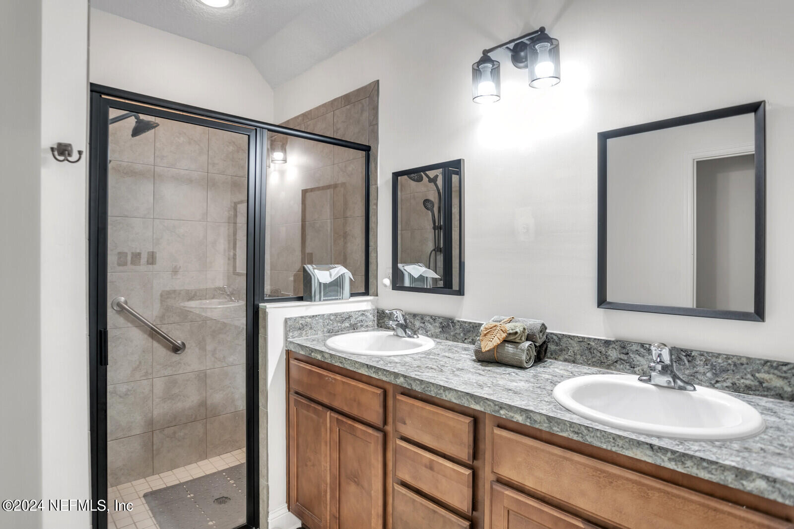 4190 Quiet Crk Loop Middleburg, FL 32068 - Photo 18 of 22 a bathroom with a granite countertop sink mirror and double