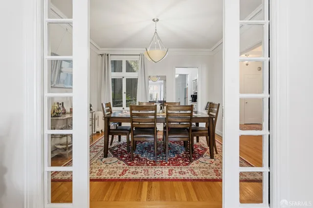 a view of a dining room with furniture