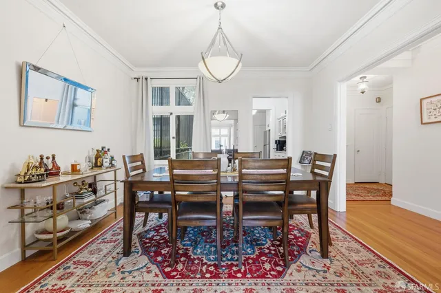a view of a dining room with furniture