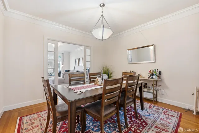 a view of a dining room with furniture