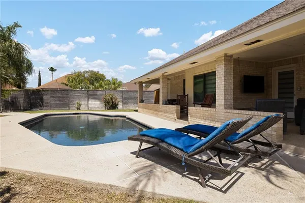 a view of kitchen with dining table and chairs