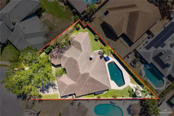 an aerial view of house with yard