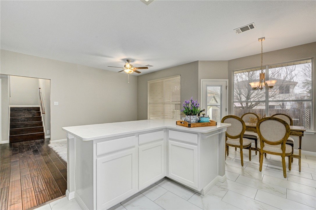 3504 Texas Topaz Drive Austin, TX 78728 - Photo 12 of 29 a kitchen with appliances cabinets and furniture