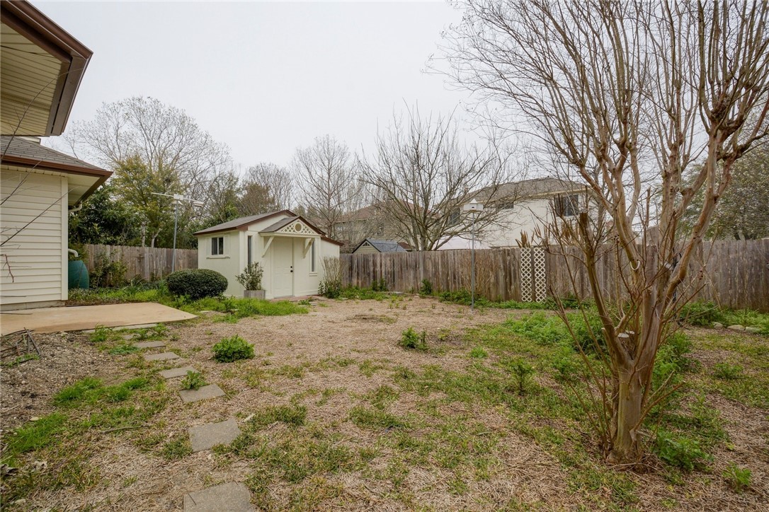 3504 Texas Topaz Drive Austin, TX 78728 - Photo 27 of 29 a big house with trees in front of it