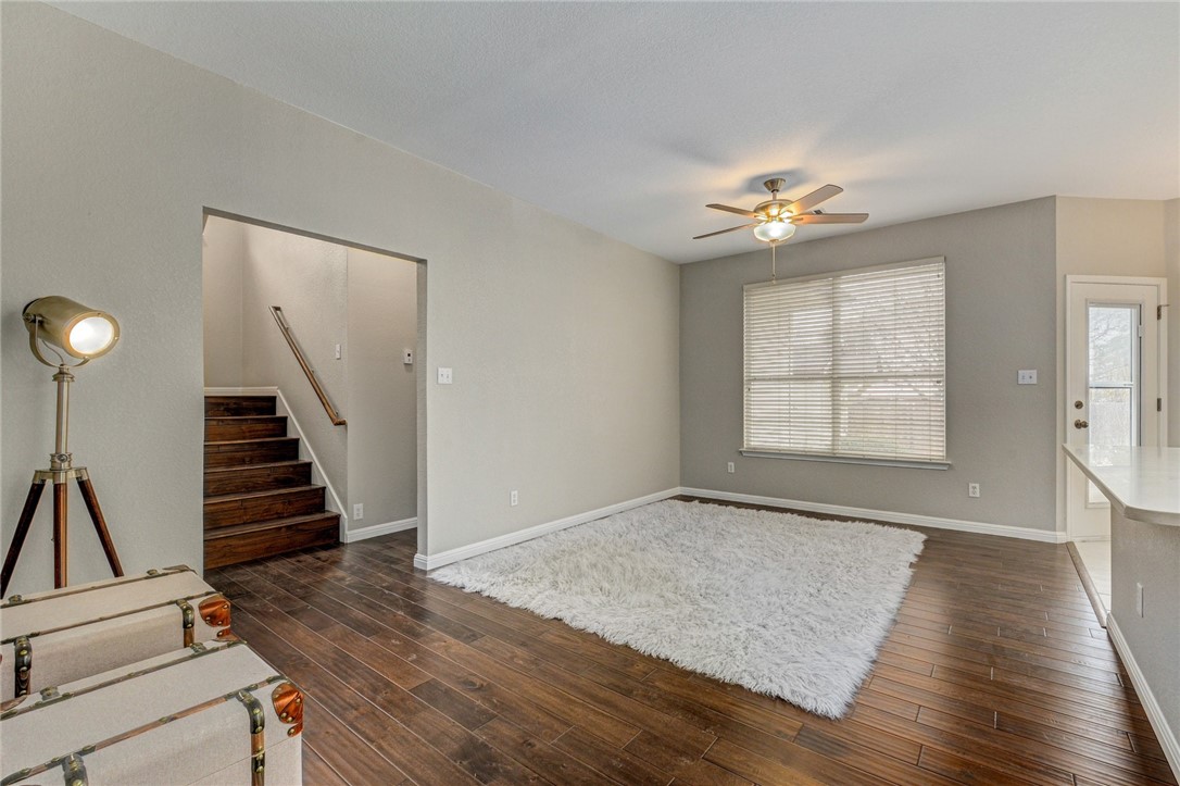 3504 Texas Topaz Drive Austin, TX 78728 - Photo 8 of 29 wooden floor in an empty room with a window