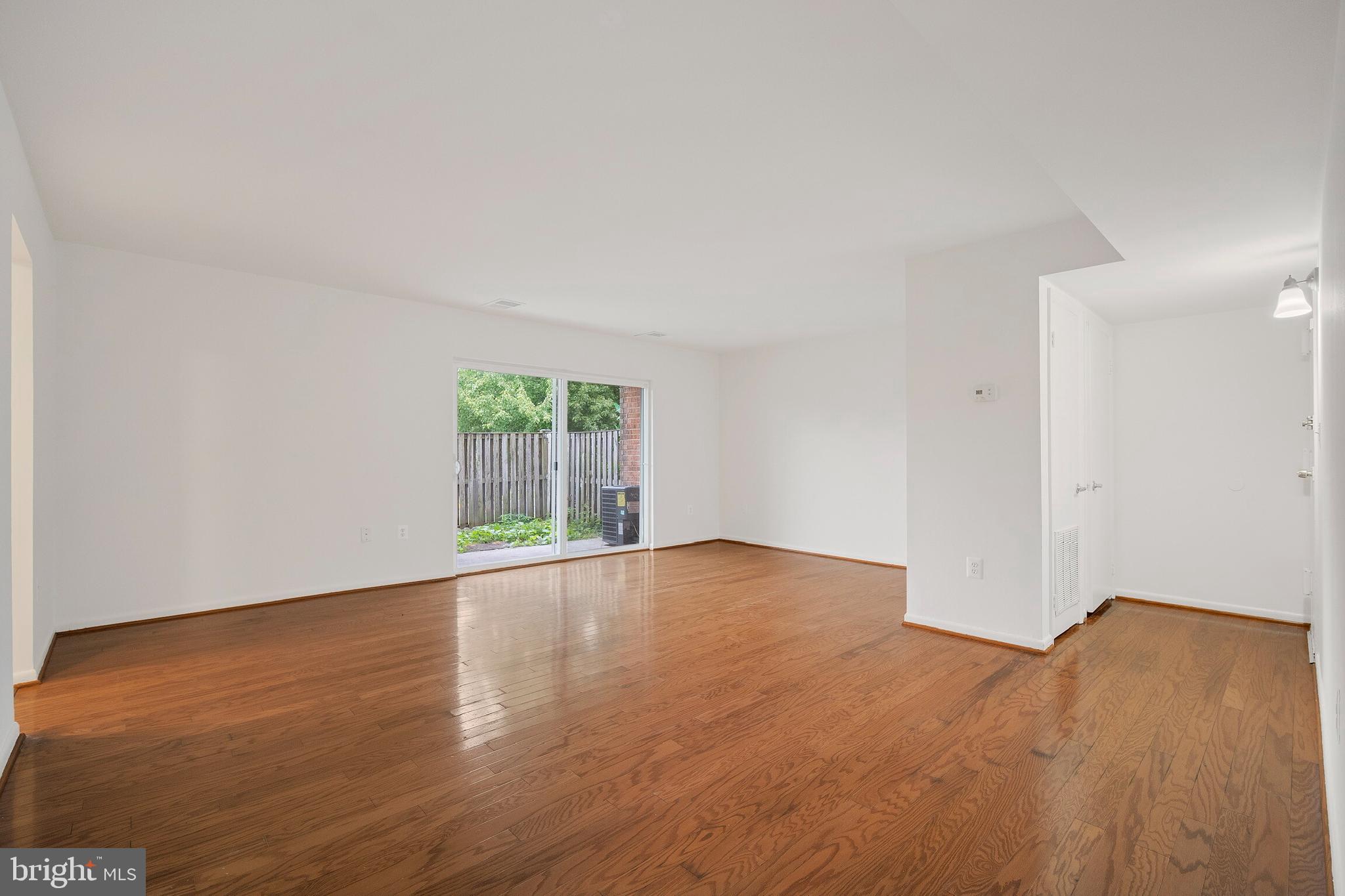 3350 Hewitt Avenue, Unit 101 Silver Spring, MD 20906 - Photo 4 of 21 Walk out to private patio and fenced yard