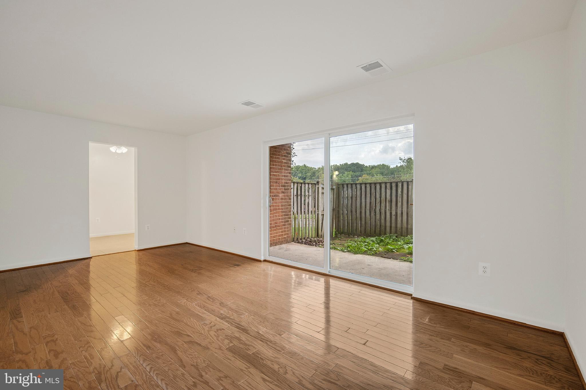 3350 Hewitt Avenue, Unit 101 Silver Spring, MD 20906 - Photo 5 of 21 Walk out to private patio and fenced yard